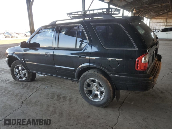2002 Isuzu Rodeo S with VIN 4S2CK58WX24309147, listed as a Copart auction lot 44266155 with 73,935 mi miles and Salvage Title. Bid and sale history available at DreamBid. Image 2.