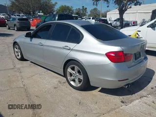 2013 BMW 3 Series 328i with VIN WBA3C1G55DNR49478, listed as a IAAI auction lot 41646742 with 142,034 mi miles and . Bid and sale history available at DreamBid. Image 3.