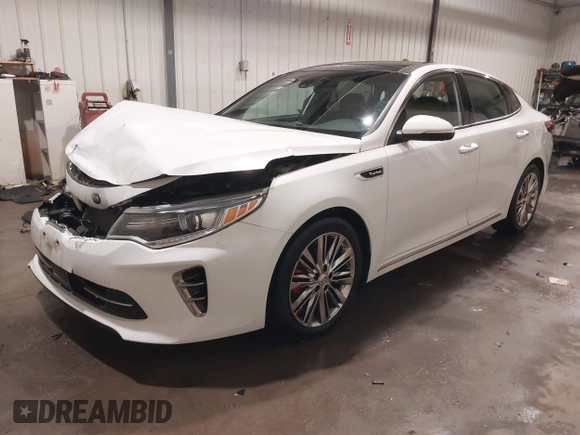 2016 Kia Optima SXL Turbo with VIN 5XXGV4L21GG073147, listed as a IAAI auction lot 41504517 with 130,467 mi miles. Bid and sale history available at carsss.com. Image 17.