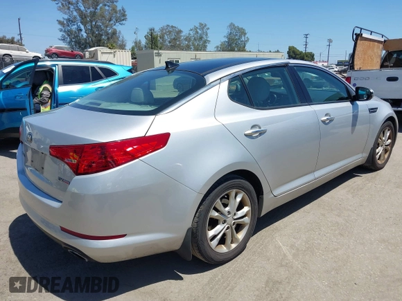 2013 Kia Optima EX with VIN 5XXGN4A72DG199317, listed as a IAAI auction lot 42517407 with 160,402 mi miles and . Bid and sale history available at DreamBid. Image 4.