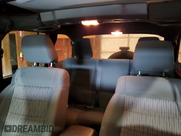 2012 Jeep Wrangler Unlimited Sport z VIN 1C4HJWDG2CL117124, wystawiony jako Copart lot #57288435 z przebiegiem 134 860 mil mil oraz Czysty tytuł • Clean title. Historia ofert i sprzedaży dostępna na DreamBid. Obrazek 10.