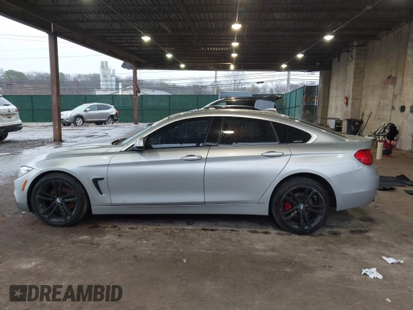 2016 BMW 4 Series 428i xDrive with VIN WBA4C9C56GG139973, listed as a IAAI auction lot 41834506 with 94,587 mi miles and . Bid and sale history available at DreamBid. Image 14.