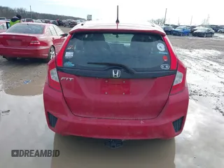 2015 Honda Fit LX z VIN 3HGGK5H54FM728448, wystawiony jako IAAI lot #41538650 z przebiegiem 115 450 mil mil oraz . Historia ofert i sprzedaży dostępna na DreamBid. Obrazek 16.
