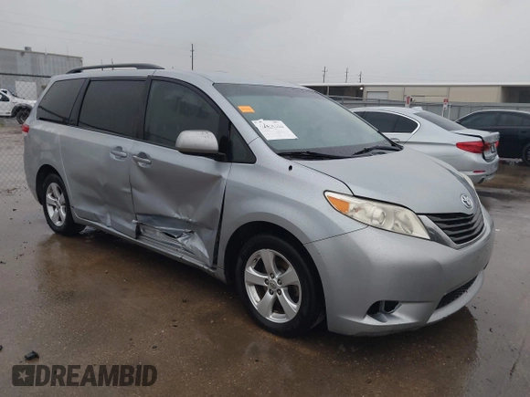 2014 Toyota Sienna LE AAS with VIN 5TDKK3DC9ES501255, listed as a IAAI auction lot 42096386 with 347,364 mi miles and . Bid and sale history available at carsss.com. Image 1.