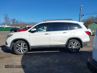 2016 Honda Pilot Touring with VIN 5FNYF6H98GB017079, listed as a IAAI auction lot 42055272 with 142,726 mi miles and . Bid and sale history available at DreamBid. Image 15.