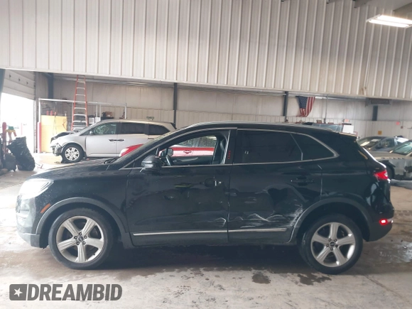 2018 Lincoln MKC Premiere with VIN 5LMCJ1C92JUL19090, listed as a IAAI auction lot 41836181 with 302,120 mi miles and . Bid and sale history available at DreamBid. Image 14.