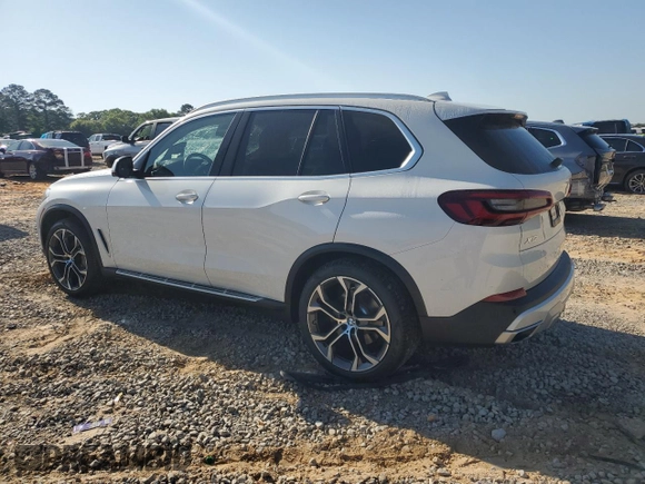 2021 BMW X5 sDrive40i with VIN 5UXCR4C05M9H39972, listed as a Copart auction lot 50839725 with 63,970 mi miles and Salvage Title. Bid and sale history available at carsss.com. Image 2.
