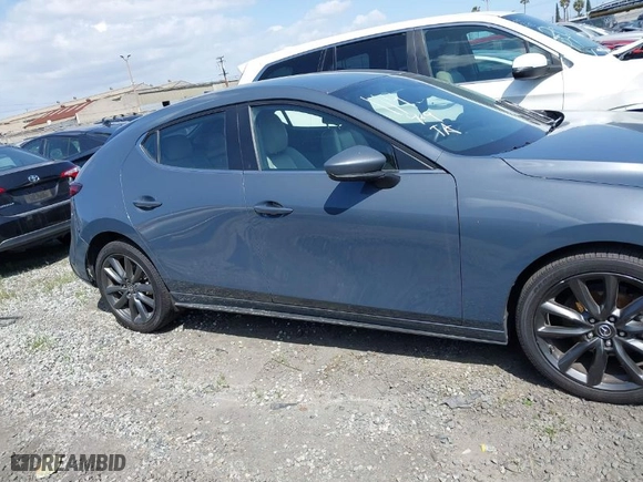 2019 Mazda Mazda3 Hatchback with VIN JM1BPALM2K1107038, listed as a IAAI auction lot 41718897 with NaN miles. Bid and sale history available at carsss.com. Image 14.