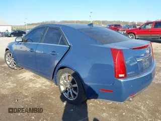 2009 Cadillac CTS AWD w/1SB with VIN 1G6DT57V290143815, listed as a IAAI auction lot 42000863 with 139,340 mi miles. Bid and sale history available at carsss.com. Image 3.