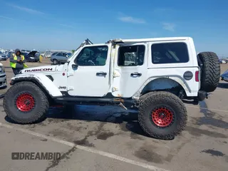 2018 Jeep Wrangler Unlimited Rubicon with VIN 1C4HJXFGXJW110629, listed as a IAAI auction lot 42141572 with 65,973 mi miles and . Bid and sale history available at DreamBid. Image 14.