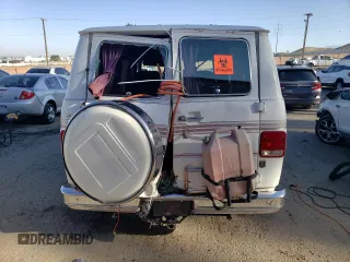 1990 Chevrolet Chevy Van z VIN 2GBEG25KXL4156338, wystawiony jako Copart lot #73499394 z przebiegiem 113 455 mil mil oraz Szkoda całkowita • Salvage title. Historia ofert i sprzedaży dostępna na DreamBid. Obrazek 6.