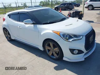 2015 Hyundai Veloster Turbo with VIN KMHTC6AE8FU218007, listed as a IAAI auction lot 42014731 with 97,086 mi miles. Bid and sale history available at carsss.com. Image 1.