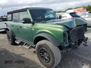2022 Ford Bronco with VIN 1FMEE5DPXNLB41526, listed as a Copart auction lot 54024184 with 32,759 mi miles and Salvage Title. Bid and sale history available at DreamBid. Image 4.