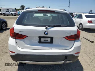 2014 BMW X1 sDrive28i z VIN WBAVM1C51EVW51832, wystawiony jako Copart lot #60153925 z przebiegiem 101 781 mil mil oraz Szkoda całkowita • Salvage title. Historia ofert i sprzedaży dostępna na DreamBid. Obrazek 6.