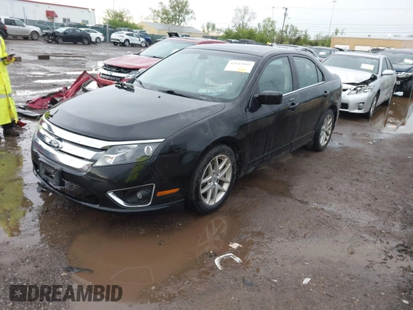 2011 Ford Fusion SEL with VIN 3FAHP0JA2BR209979, listed as a IAAI auction lot 42143065 with 185,192 mi miles and . Bid and sale history available at carsss.com. Image 2.