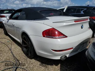 2009 BMW 6 Series 650i with VIN WBAEB53589CX64448, listed as a Copart auction lot 73867784 with 80,795 mi miles and Salvage Title. Bid and sale history available at carsss.com. Image 6.