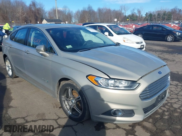 2015 Ford Fusion SE Hybrid with VIN 3FA6P0LUXFR133979, listed as a IAAI auction lot 41831288 with 143,738 mi miles. Bid and sale history available at carsss.com. Image 1.