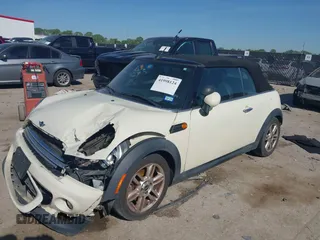 2013 MINI Convertible with VIN WMWZN3C58DT568824, listed as a IAAI auction lot 41998124 with 134,191 mi miles and . Bid and sale history available at DreamBid. Image 2.