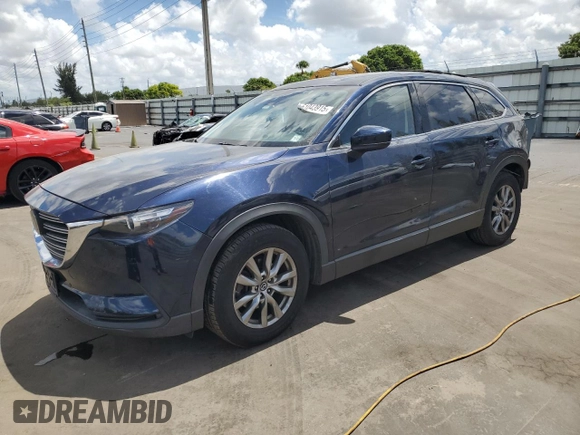 2018 Mazda CX-9 Touring with VIN JM3TCBCY3J0235048, listed as a Copart auction lot 61043915 with 82,869 mi miles and Salvage title. Bid and sale history available at DreamBid. Image 1.