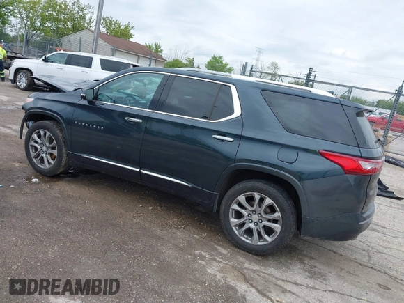2018 Chevrolet Traverse Premier z VIN 1GNEVJKW4JJ240024, wystawiony jako IAAI lot #42369659 z przebiegiem 160 147 mil mil oraz . Historia ofert i sprzedaży dostępna na DreamBid. Obrazek 3.