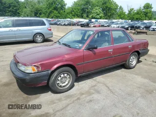 1991 Toyota Camry z VIN 4T1SV24E2MU387012, wystawiony jako Copart lot #57576164 z przebiegiem 117 436 mil mil oraz Nie do naprawy • Non repairable. Historia ofert i sprzedaży dostępna na DreamBid. Obrazek 1.