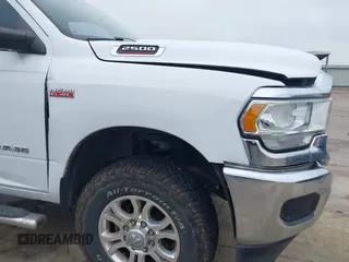 2020 Ram 2500 Tradesman z VIN 3C6UR5CJ4LG235002, wystawiony jako IAAI lot #42117169 z przebiegiem 170 299 mil mil oraz . Historia ofert i sprzedaży dostępna na DreamBid. Obrazek 21.