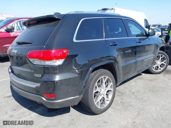 2018 Jeep Grand Cherokee Limited with VIN 1C4RJFBGXJC203561, listed as a IAAI auction lot 41670783 with 69,648 mi miles. Bid and sale history available at carsss.com. Image 4.