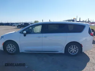 2023 Chrysler Pacifica Touring L with VIN 2C4RC1BG6PR531640, listed as a IAAI auction lot 42251680 with 31,638 mi miles and . Bid and sale history available at DreamBid. Image 14.