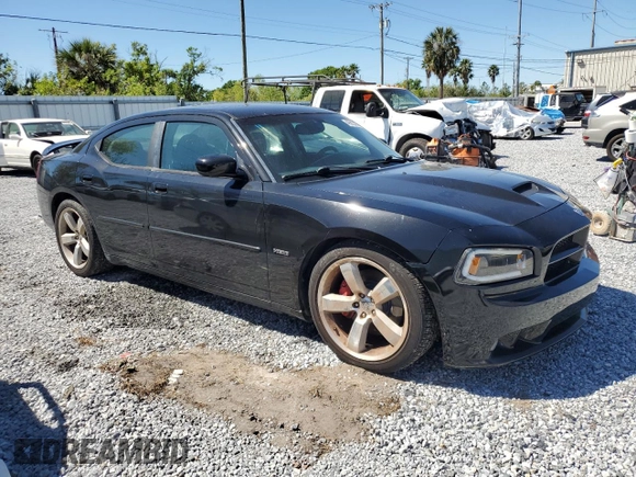 2006 Dodge Charger SRT-8 with VIN 2B3KA73W16H476021, listed as a Copart auction lot 49822835 with 197,111 mi miles and Salvage Title. Bid and sale history available at DreamBid. Image 4.