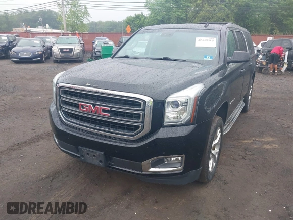 2015 GMC Yukon XL SLT z VIN 1GKS2HKC1FR146778, wystawiony jako IAAI lot #42449315 z przebiegiem 197 577 mil mil oraz . Historia ofert i sprzedaży dostępna na DreamBid. Obrazek 6.