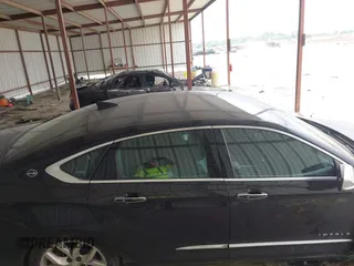 2018 Chevrolet Impala Premier with VIN 2G1125S3XJ9164052, listed as a IAAI auction lot 42232908 with 100,025 mi miles and . Bid and sale history available at DreamBid. Image 13.