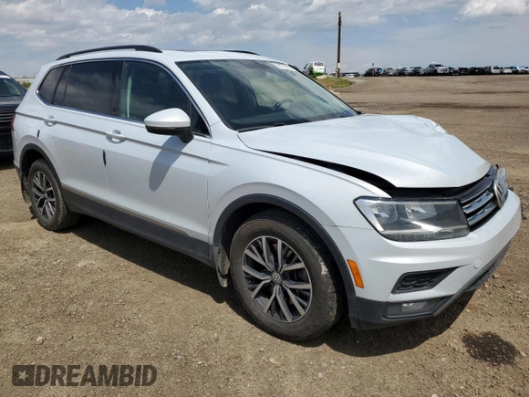 2018 Volkswagen Tiguan SEL с VIN 3VV2B7AX2JM149176, выставлен на аукционе Copart как лот 62176525 с пробегом 139 556 миль миль и Списание • Salvage title. История ставок и продаж доступна на DreamBid. Изображение 4.