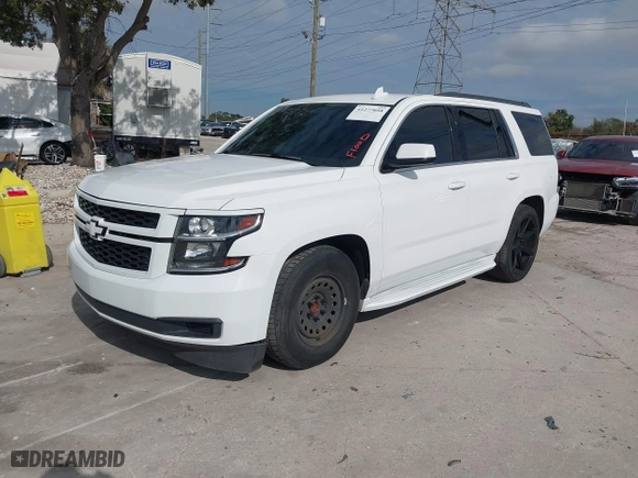 2017 Chevrolet Tahoe LS with VIN 1GNSCAKC9HR281906, listed as a IAAI auction lot 41277058 with 177,980 mi miles. Bid and sale history available at carsss.com. Image 2.