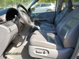 2005 Honda Odyssey EX-L z VIN 5FNRL386X5B034514, wystawiony jako Copart lot #52702435 z przebiegiem 65 988 mil mil oraz Szkoda całkowita • Salvage title. Historia ofert i sprzedaży dostępna na DreamBid. Obrazek 7.