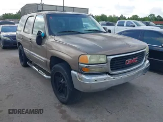 2004 GMC Yukon SLT with VIN 1GKEC13V54J218787, listed as a IAAI auction lot 42047107 with 1 mi miles. Bid and sale history available at carsss.com. Image 1.