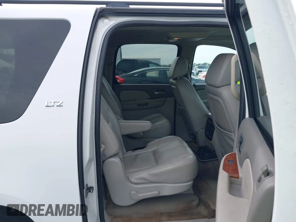 2008 Chevrolet Suburban LTZ with VIN 1GNFC16018R143195, listed as a IAAI auction lot 41577367 with 223,506 mi miles and . Bid and sale history available at DreamBid. Image 8.