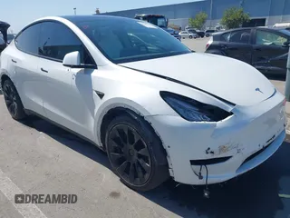 2021 Tesla Model Y Long Range with VIN 5YJYGDEEXMF280480, listed as a IAAI auction lot 41993633 with 69,579 mi miles. Bid and sale history available at carsss.com. Image 6.