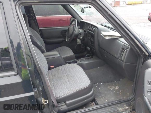 2000 Jeep Cherokee with VIN 1J4FF48S4YL145195, listed as a IAAI auction lot 42302654 with 173,764 mi miles and . Bid and sale history available at DreamBid. Image 5.