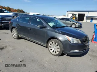 2014 Buick LaCrosse Leather with VIN 1G4GC5G37EF291003, listed as a Copart auction lot 76665934 with 217,036 mi miles and Salvage title. Bid and sale history available at DreamBid. Image 4.