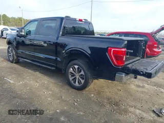 2021 Ford F-150 XL with VIN 1FTFW1CD4MFC76410, listed as a IAAI auction lot 41405983 with 79,768 mi miles and . Bid and sale history available at DreamBid. Image 3.