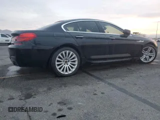 2013 BMW 6 Series 650i with VIN WBA6B2C50DD128323, listed as a Copart auction lot 43059985 with 106,861 mi miles and Clean Title. Bid and sale history available at DreamBid. Image 3.