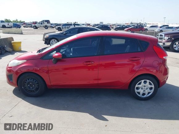 2012 Ford Fiesta SE z VIN 3FADP4EJ9CM140948, wystawiony jako IAAI lot #42301818 z przebiegiem 109 276 mil mil oraz . Historia ofert i sprzedaży dostępna na DreamBid. Obrazek 15.