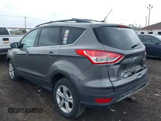 2013 Ford Escape SE with VIN 1FMCU9GX4DUB35629, listed as a IAAI auction lot 42446685 with 103,420 mi miles and . Bid and sale history available at DreamBid. Image 3.