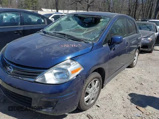 2009 Nissan Versa 1.8 S with VIN 3N1BC11E39L378963, listed as a IAAI auction lot 41829690 with 169,531 mi miles. Bid and sale history available at carsss.com. Image 2.