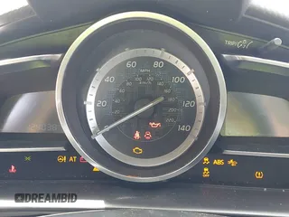 2016 Scion iA z VIN 3MYDLBZVXGY136298, wystawiony jako IAAI lot #42014712 z przebiegiem 124 038 mil mil oraz . Historia ofert i sprzedaży dostępna na DreamBid. Obrazek 7.