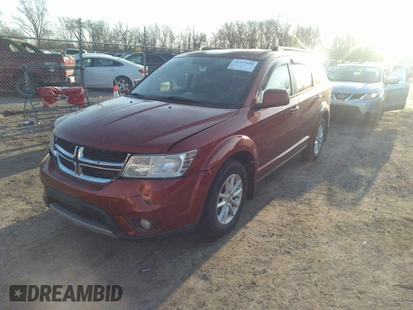 2013 Dodge Journey SXT with VIN 3C4PDCBG4DT659738, listed as a IAAI auction lot 41777689 with 165,050 mi miles. Bid and sale history available at carsss.com. Image 2.