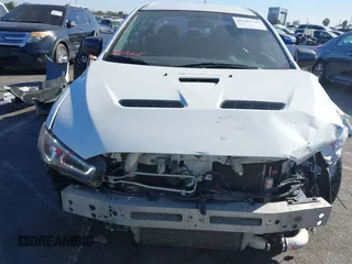 2012 Mitsubishi Lancer Evolution MR with VIN JA32W5FV3CU009679, listed as a IAAI auction lot 40787549 with 167,206 mi miles. Bid and sale history available at carsss.com. Image 13.