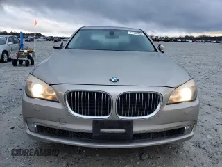 2012 BMW 7 Series 740i with VIN WBAKA4C56CDS99041, listed as a Copart auction lot 41436735 with 170,059 mi miles and Clean title. Bid and sale history available at DreamBid. Image 5.