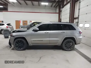 2018 Jeep Grand Cherokee Laredo E with VIN 1C4RJFAG6JC102969, listed as a IAAI auction lot 41963137 with 112,361 mi miles and . Bid and sale history available at DreamBid. Image 14.