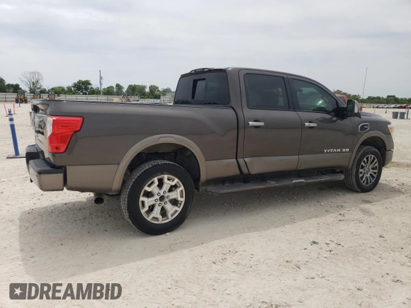 2016 Nissan Titan Platinum Reserve z VIN 1N6BA1F27GN507136, wystawiony jako Copart lot #53681615 z przebiegiem 155 101 mil mil oraz Czysty tytuł • Clean title. Historia ofert i sprzedaży dostępna na DreamBid. Obrazek 3.